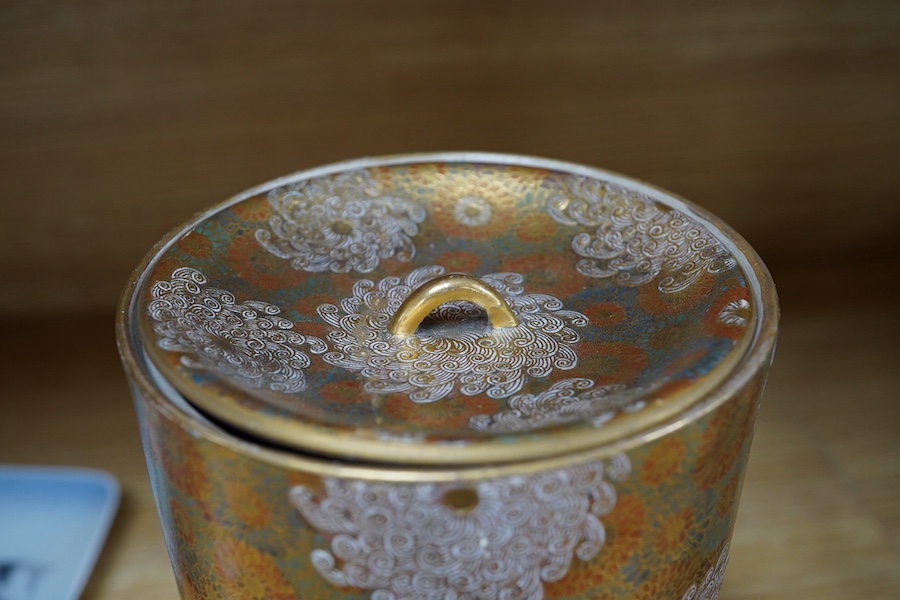 A Japanese Satsuma pottery lidded jar, Meiji period, decorated and gilded with flowers, signed to the base, 14cm high. Condition - lid restored